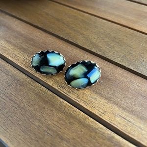 black, gold, and yellow clip on earrings